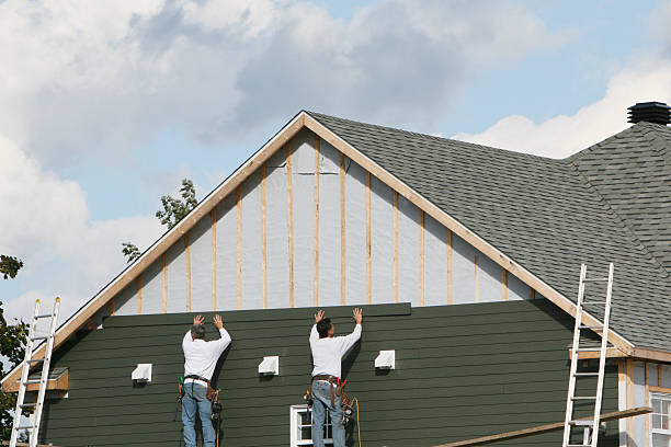 Professional Emergency Siding Repair technician working in Dublin, VA